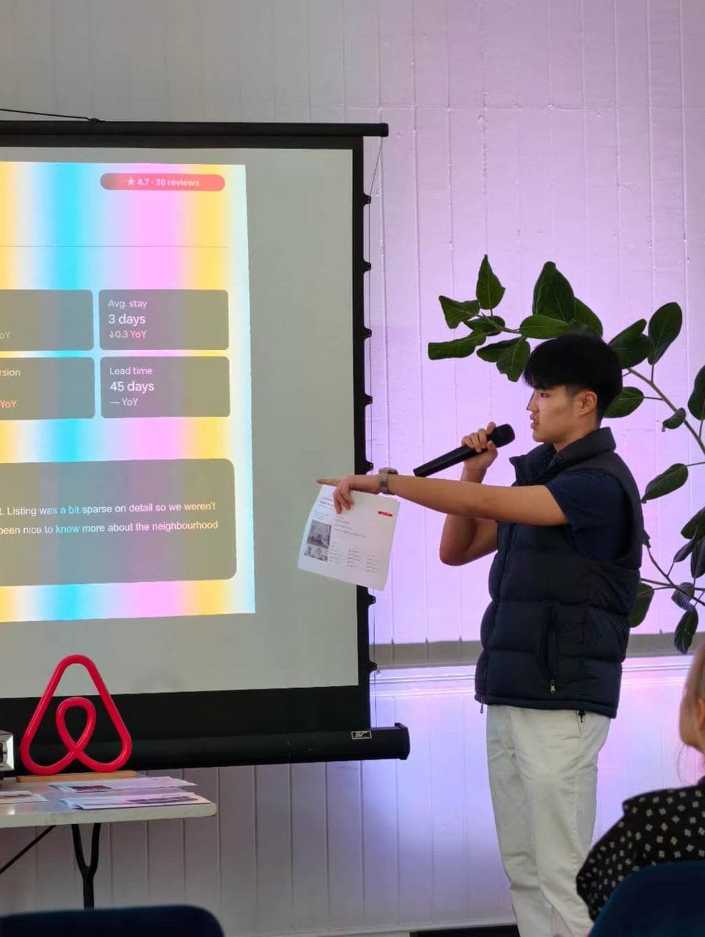Jake Leung presenting listing performance metrics at the Airbnb Queensland Host Workshop