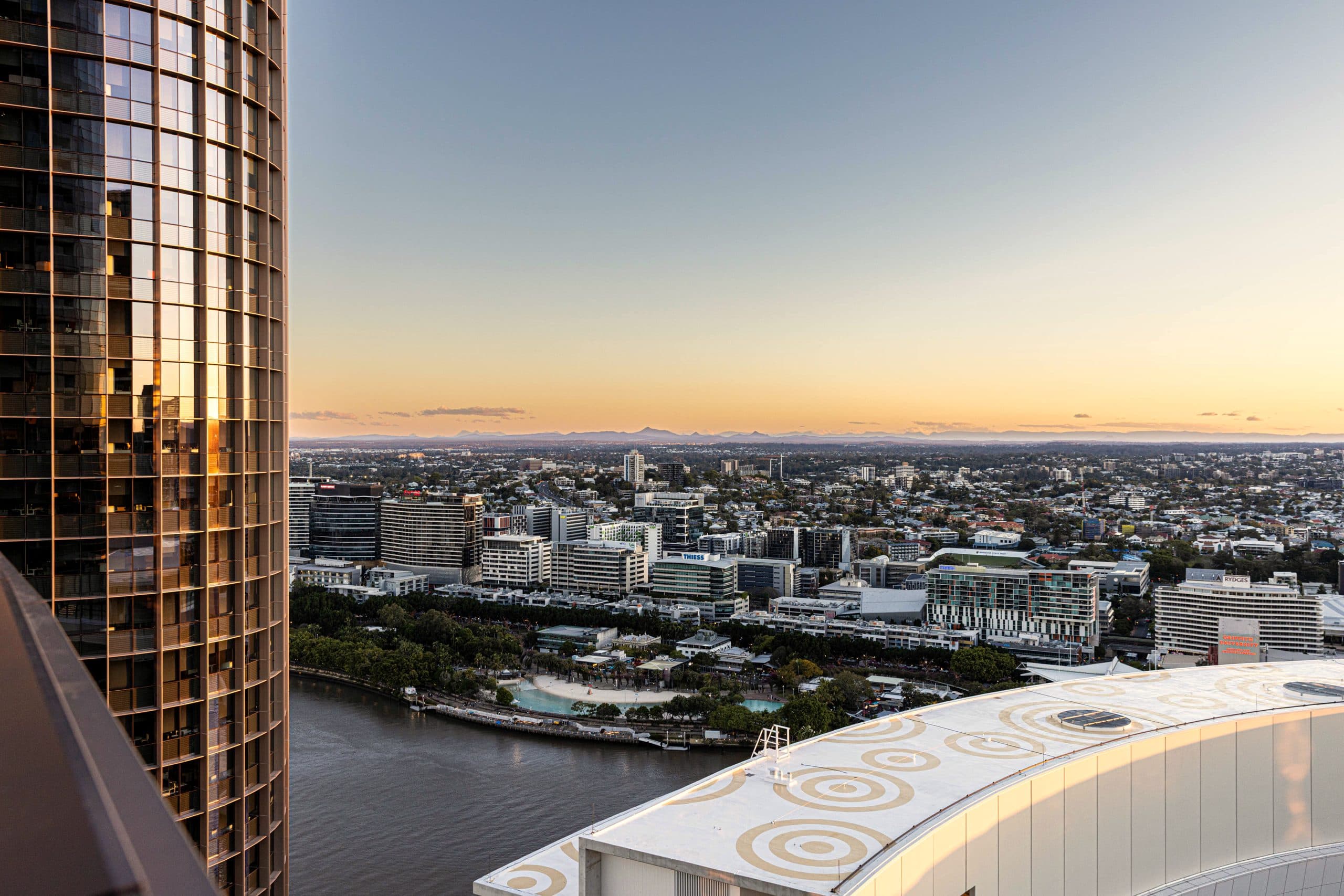 Dusk over Brisbane from a Queens Wharf apartment balcony